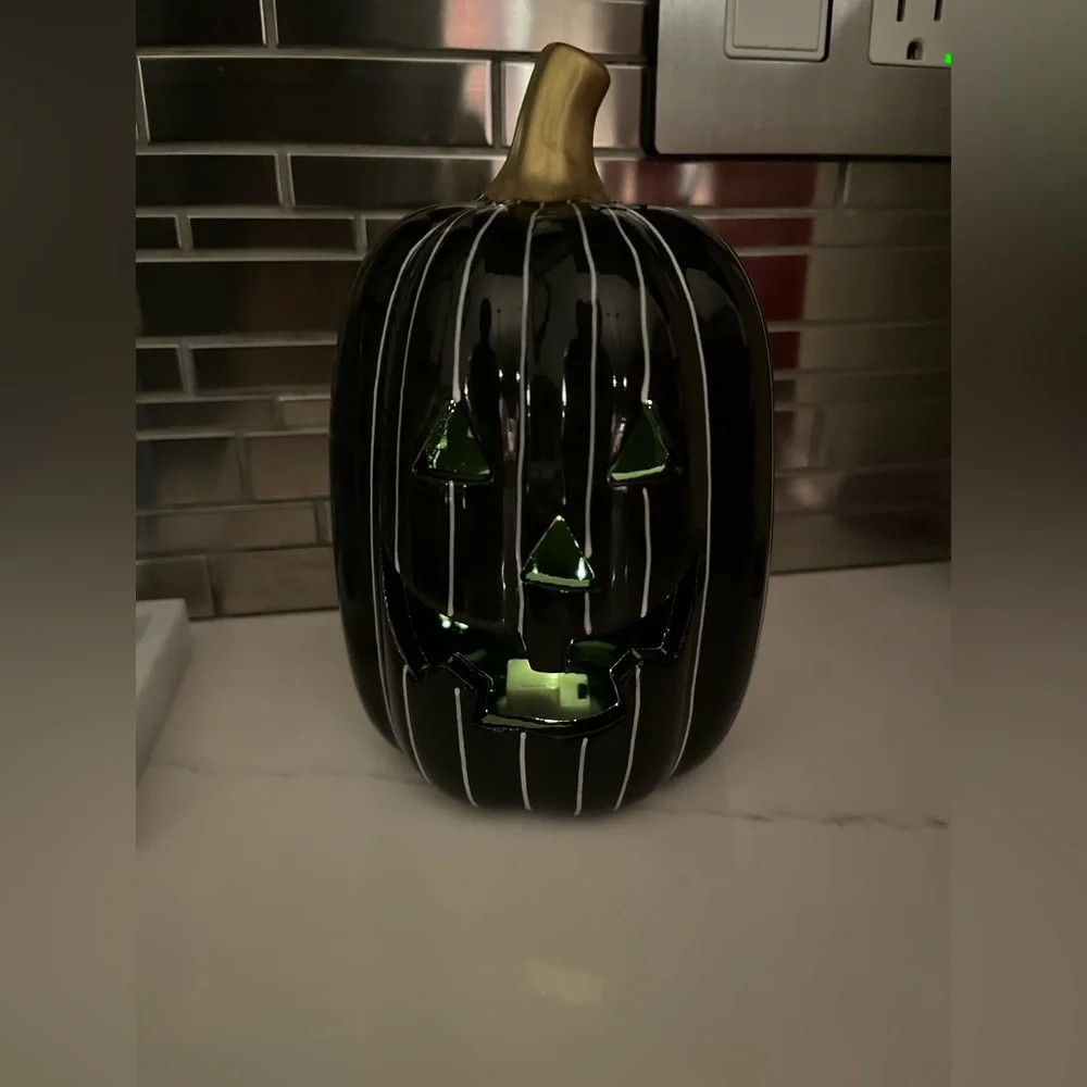 Target bullseye’s playground ceramic LED light up pumpkin. Black w/white stripes